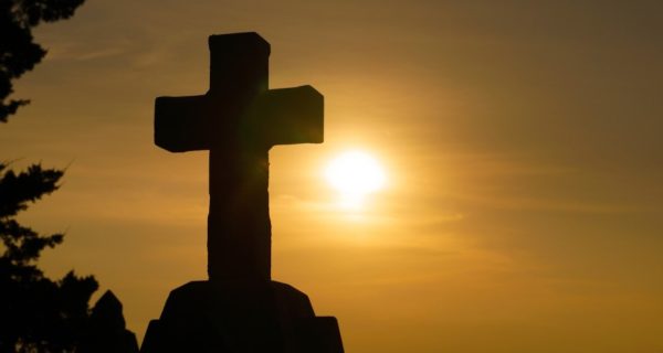 Posing for Selfies at the Foot of the Cross